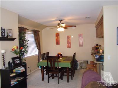 464 West Wooley Road Oxnard, CA 93030 - Photo 2 of 10 a dining room with furniture and a chandelier