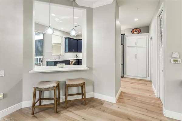 a bathroom with a sink a mirror and a shower
