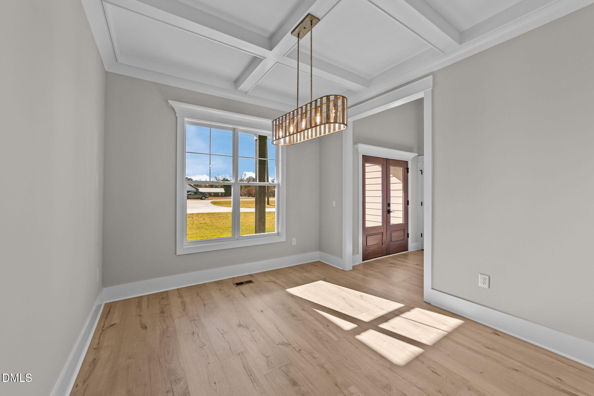 2568 Lassiter Road Four Oaks, NC 27524 - Photo 12 of 50 a view of a room with window and wooden floor