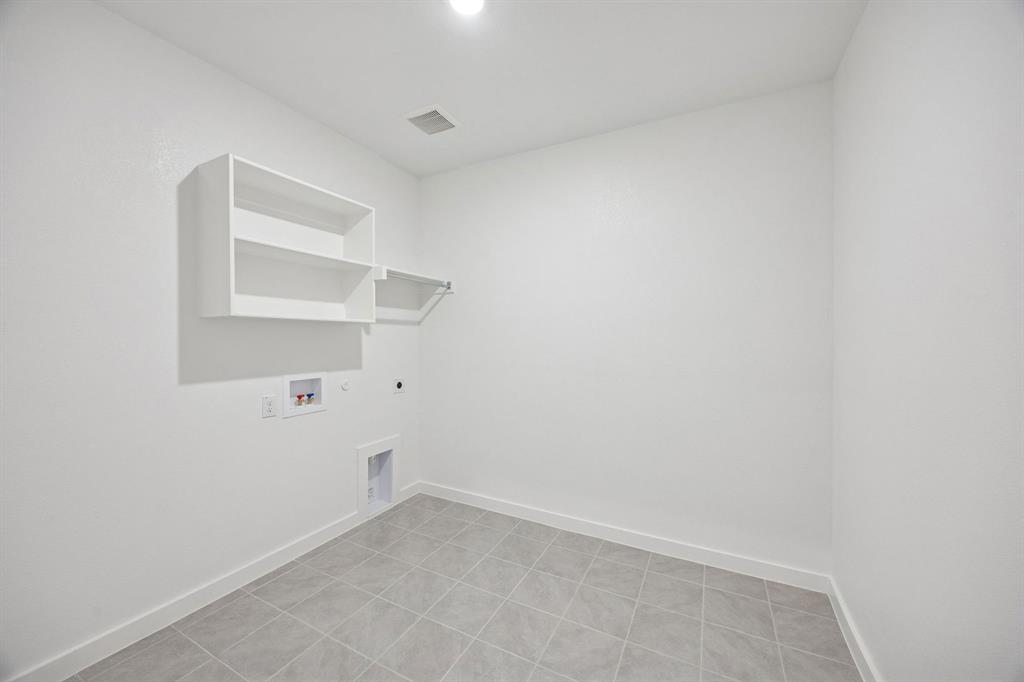 1477 Companero Street Haslet, TX 76052 - Photo 30 of 35 Utility Room in the Wimbledon home plan by Trophy Signature Homes – REPRESENTATIVE PHOTO