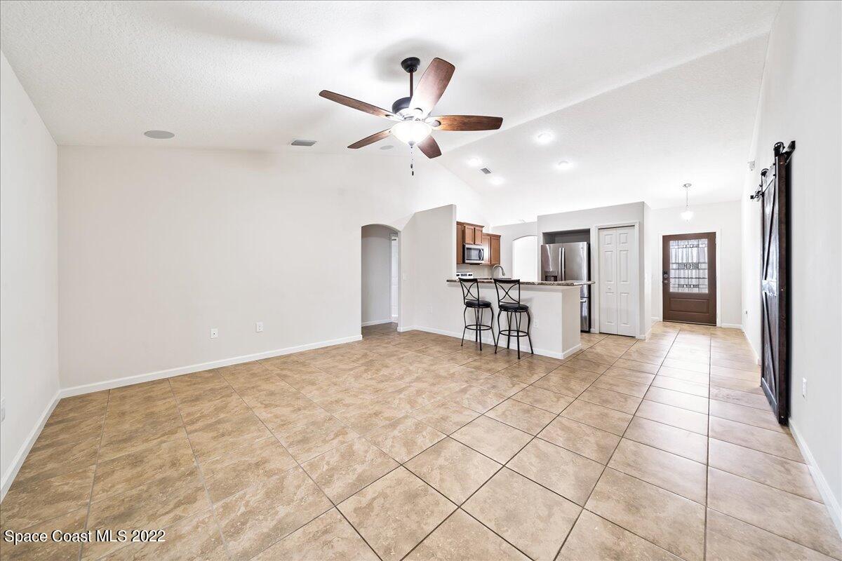 6175 Adina Road Cocoa, FL 32927 - Photo 14 of 29 a view of kitchen with furniture and window