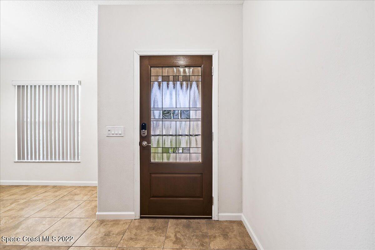 6175 Adina Road Cocoa, FL 32927 - Photo 4 of 29 a view of an entryway door