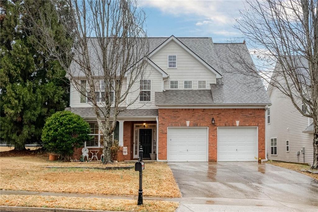 151 Diamond Ridge Avenue Canton, GA 30114 - Photo 1 of 1 a front view of a house with garden