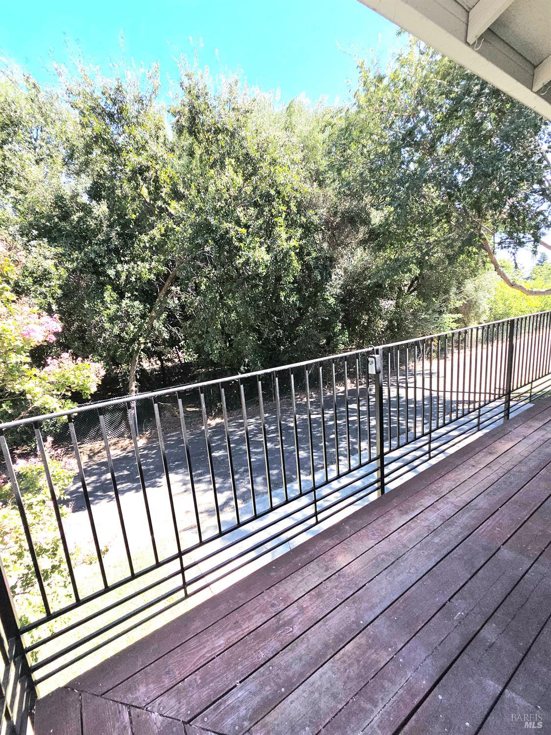 140 Del Rio Court, Unit 4 Vacaville, CA 95687 - Photo 5 of 25 a view of balcony with wooden floor