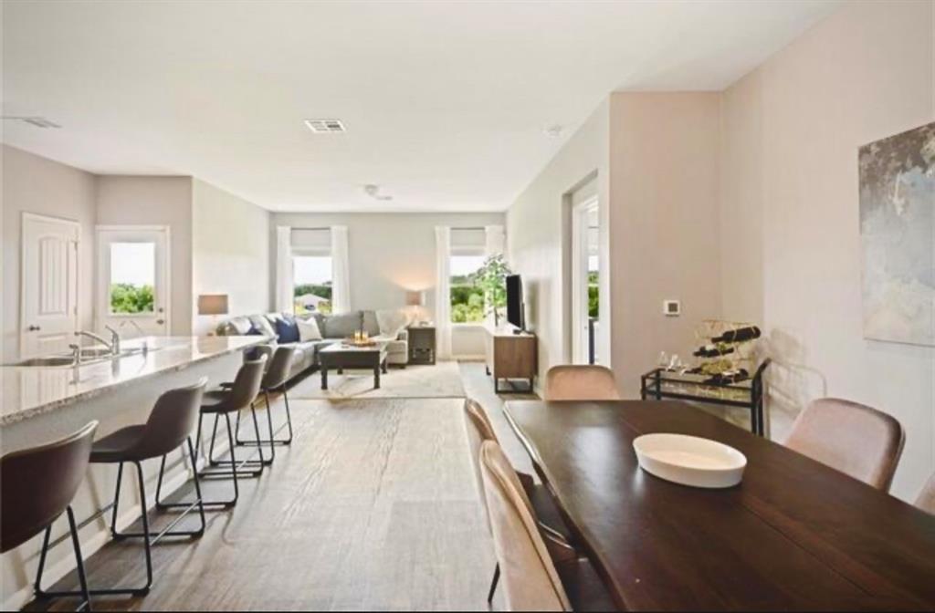 15117 Diamondleaf Cove Austin, TX 78724 - Photo 6 of 13 a living room with furniture and a large window