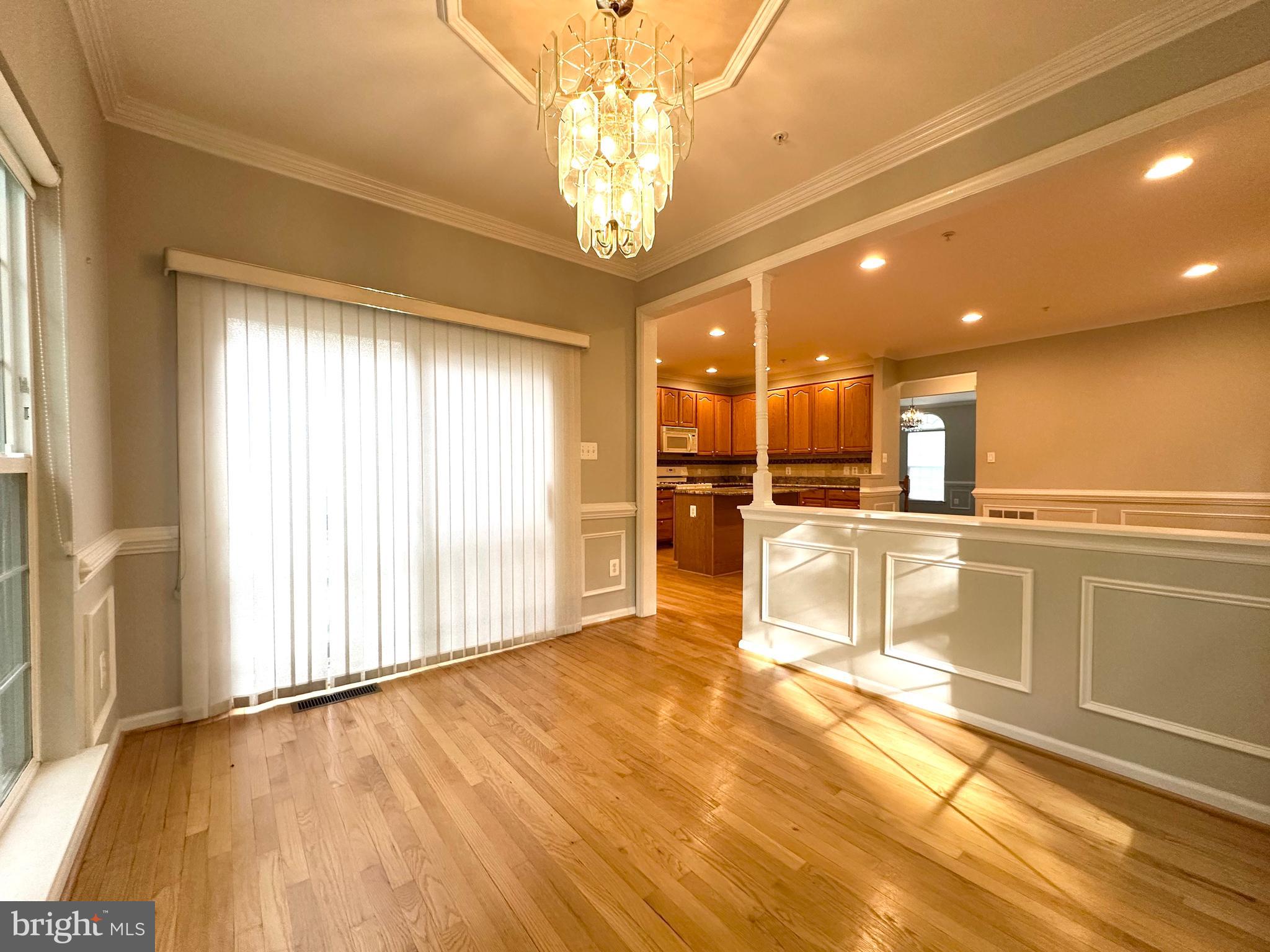 18100 Truffle Lane Boyds, MD 20841 - Photo 15 of 39 a view of a kitchen with granite countertop a refrigerator and a sink