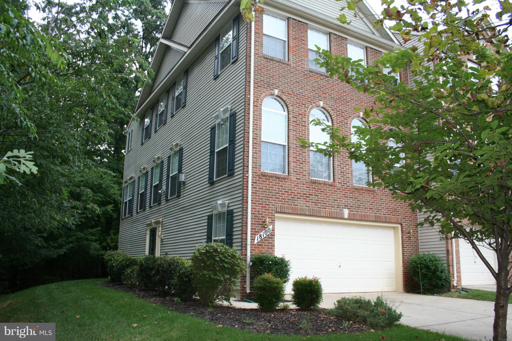 18100 Truffle Lane Boyds, MD 20841 - Photo 2 of 39 a front view of a house with garden