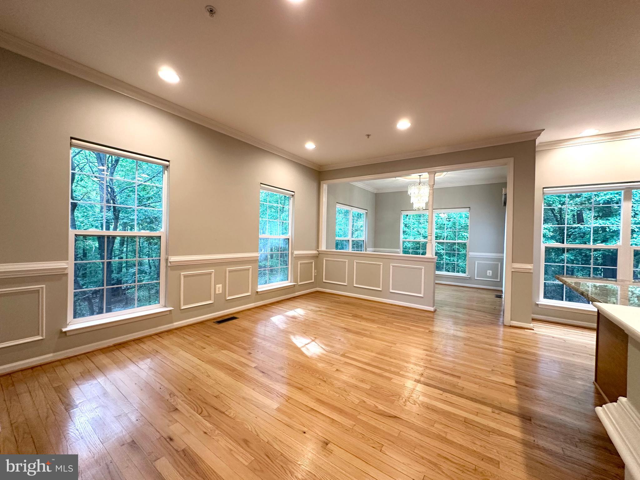 18100 Truffle Lane Boyds, MD 20841 - Photo 24 of 39 a view of an empty room with wooden floor and a window