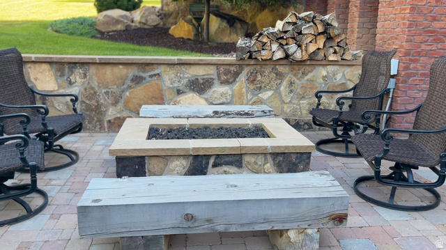 426 West Center Street Parowan, UT 84761 - Photo 80 of 107 Outdoor patio featuring a stone fire pit with a light-colored capstone, surrounded by a paver surface