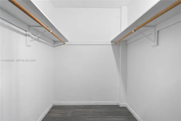 a view of a room with racks on the wall