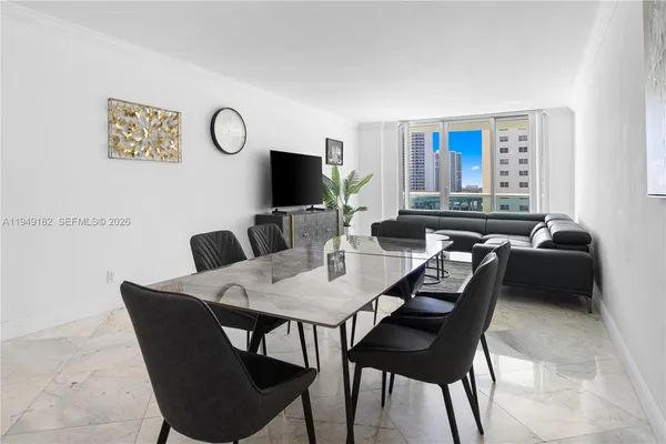 a view of a dining room with furniture