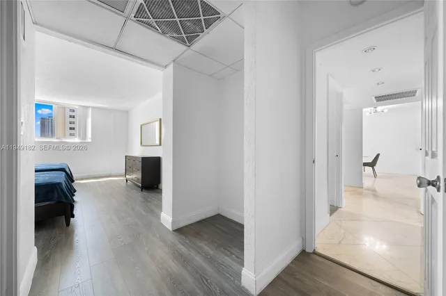 a view of living room with furniture and window