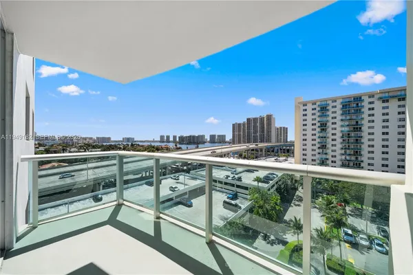 a balcony with a city view