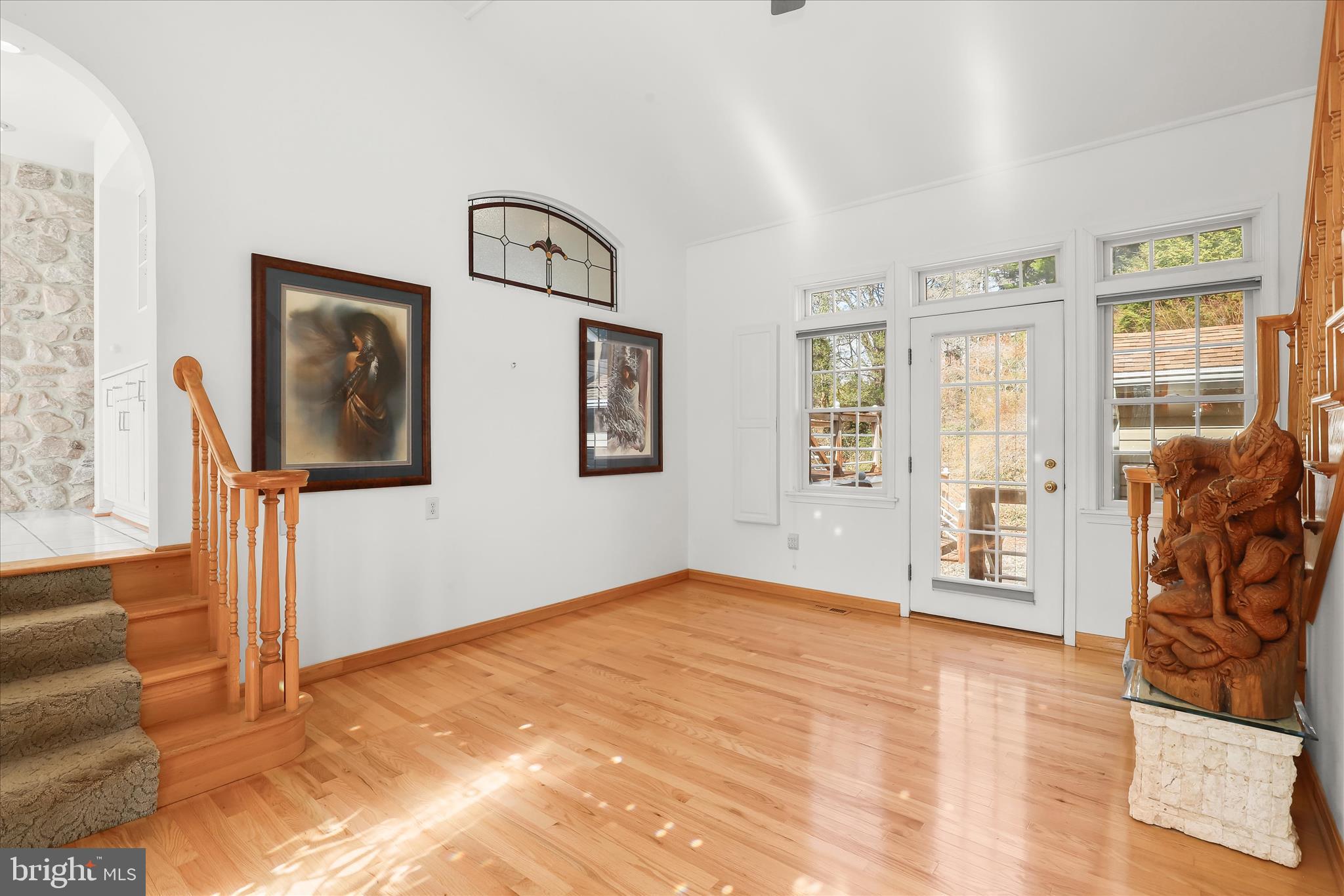 13612 Jacobs Road Mount Airy, MD 21771 - Photo 49 of 90 a view of an empty room with wooden floor and a window