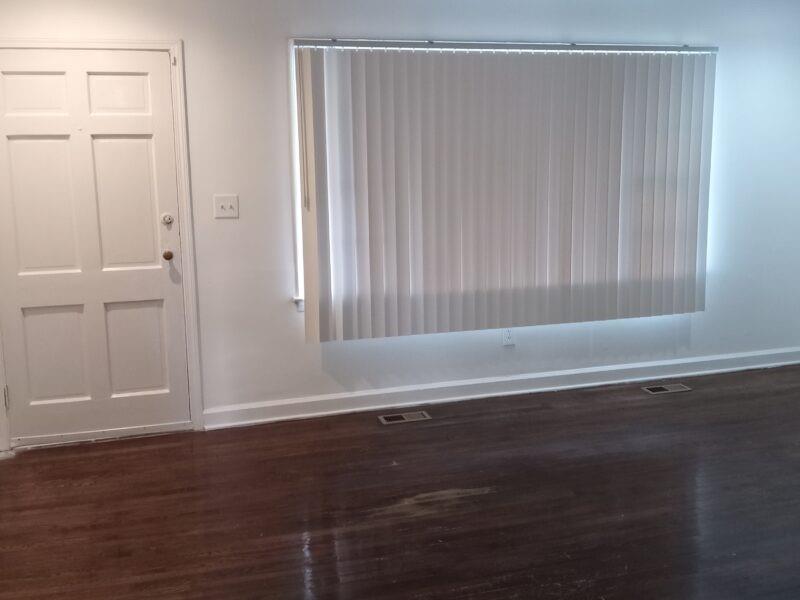3545 Orchard Street Clarkston, GA 30021 - Photo 2 of 13 an empty room with wooden floor