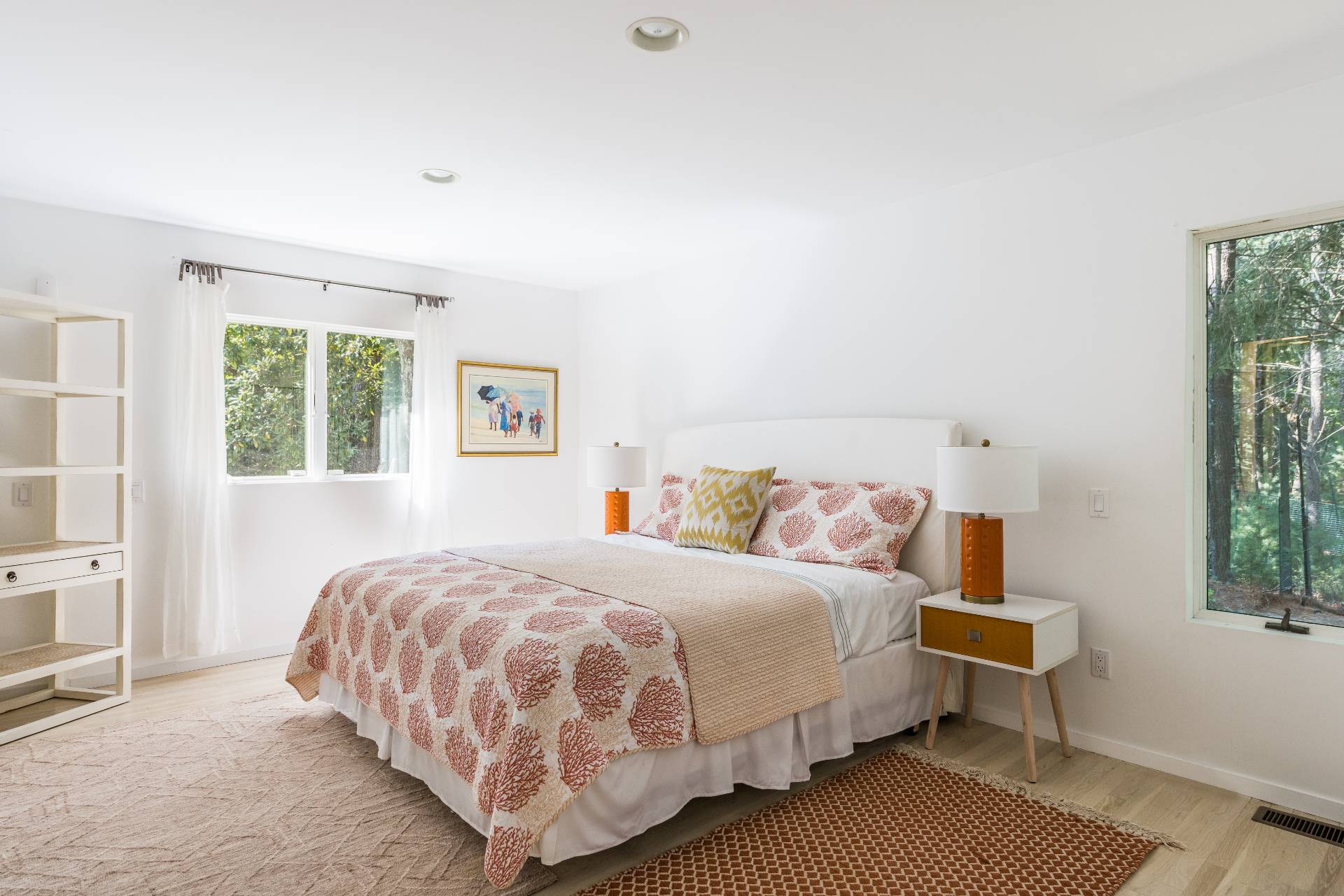 52 Bull Path East Hampton, NY 11937 - Photo 15 of 24 a bedroom with a bed lamp and a window