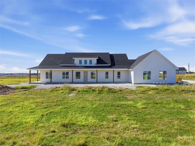 a house view with a garden space