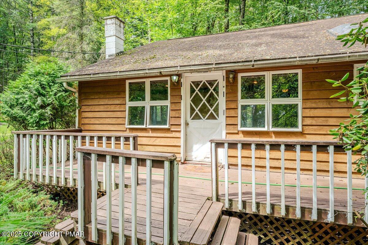 115 Dirk Road Tafton, PA 18464 - Photo 24 of 24 a front view of a house with a glass door