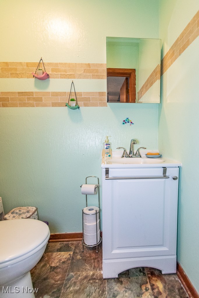 5612 Hopkins Road Mentor, OH 44060 - Photo 17 of 21 Bathroom with vanity and toilet