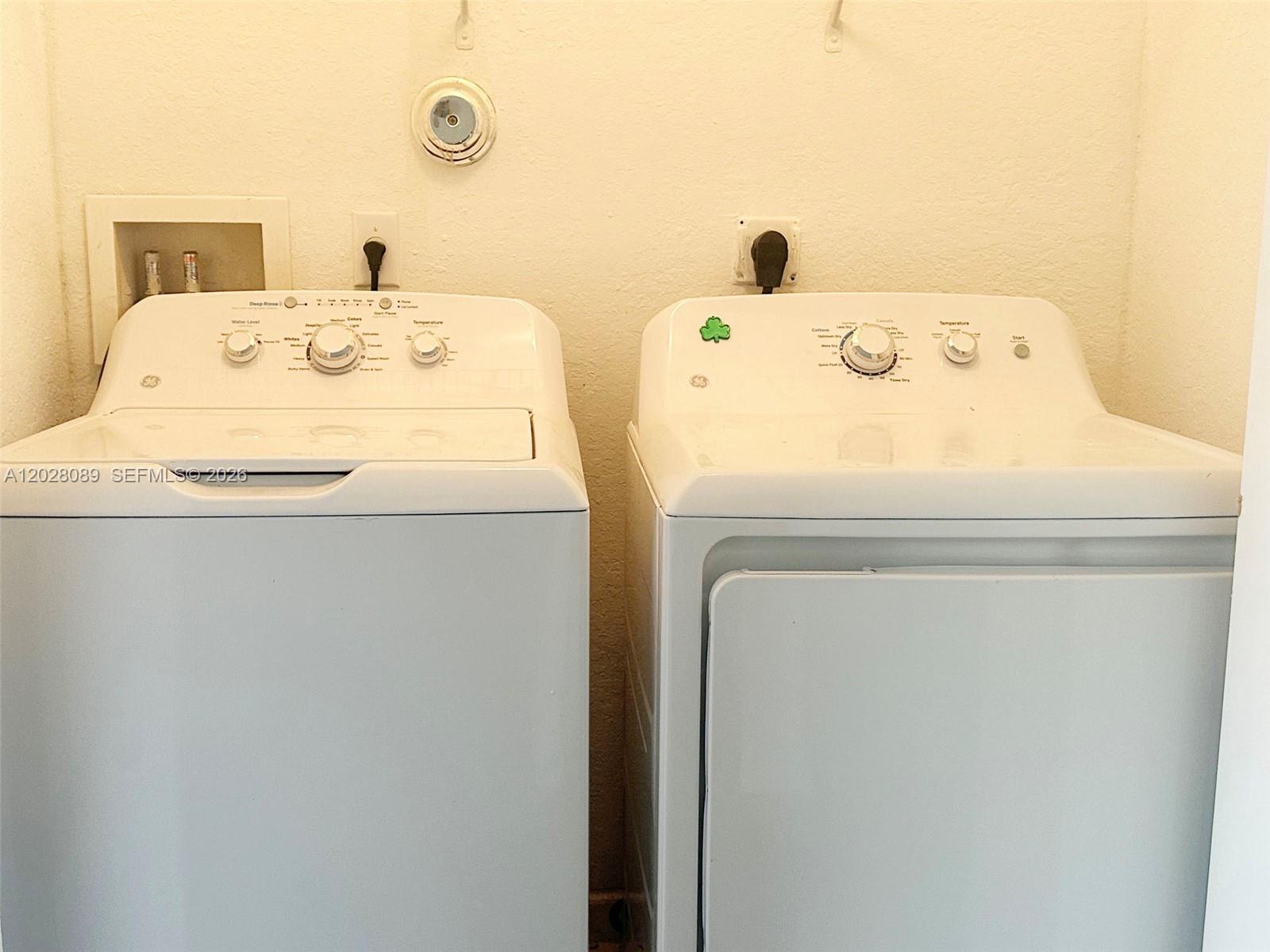 662 Northeast 21st Terrace Homestead, FL 33033 - Photo 25 of 34 a utility room with dryer and washer