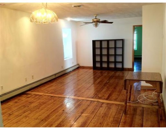 175 Trenton Street, Unit 3 Boston, MA 02128 - Photo 4 of 5 a view of an empty room with a window