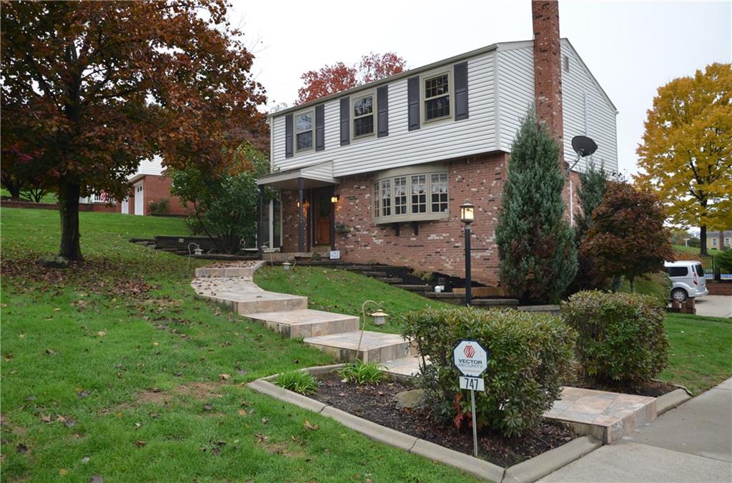 747 Charles Street Rochester, PA 15074 - Photo 1 of 23 Well maintained lawn and landscaping and hardscaping