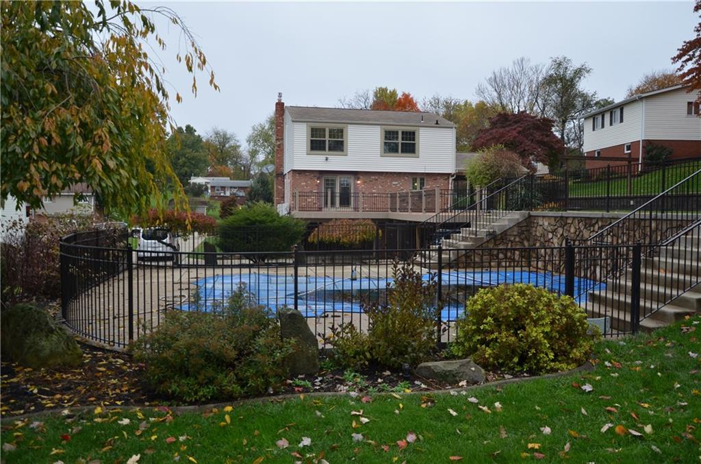 747 Charles Street Rochester, PA 15074 - Photo 19 of 23 Beautiful Pool with wide stairs, leading to a large Trex-type deck