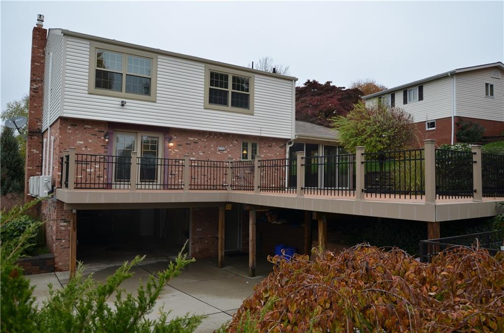747 Charles Street Rochester, PA 15074 - Photo 20 of 23 Deck and 2 Car Garage shown, 3 Season room to far right.