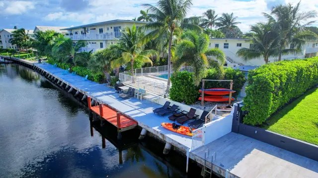 an outdoor sitting area with chairs