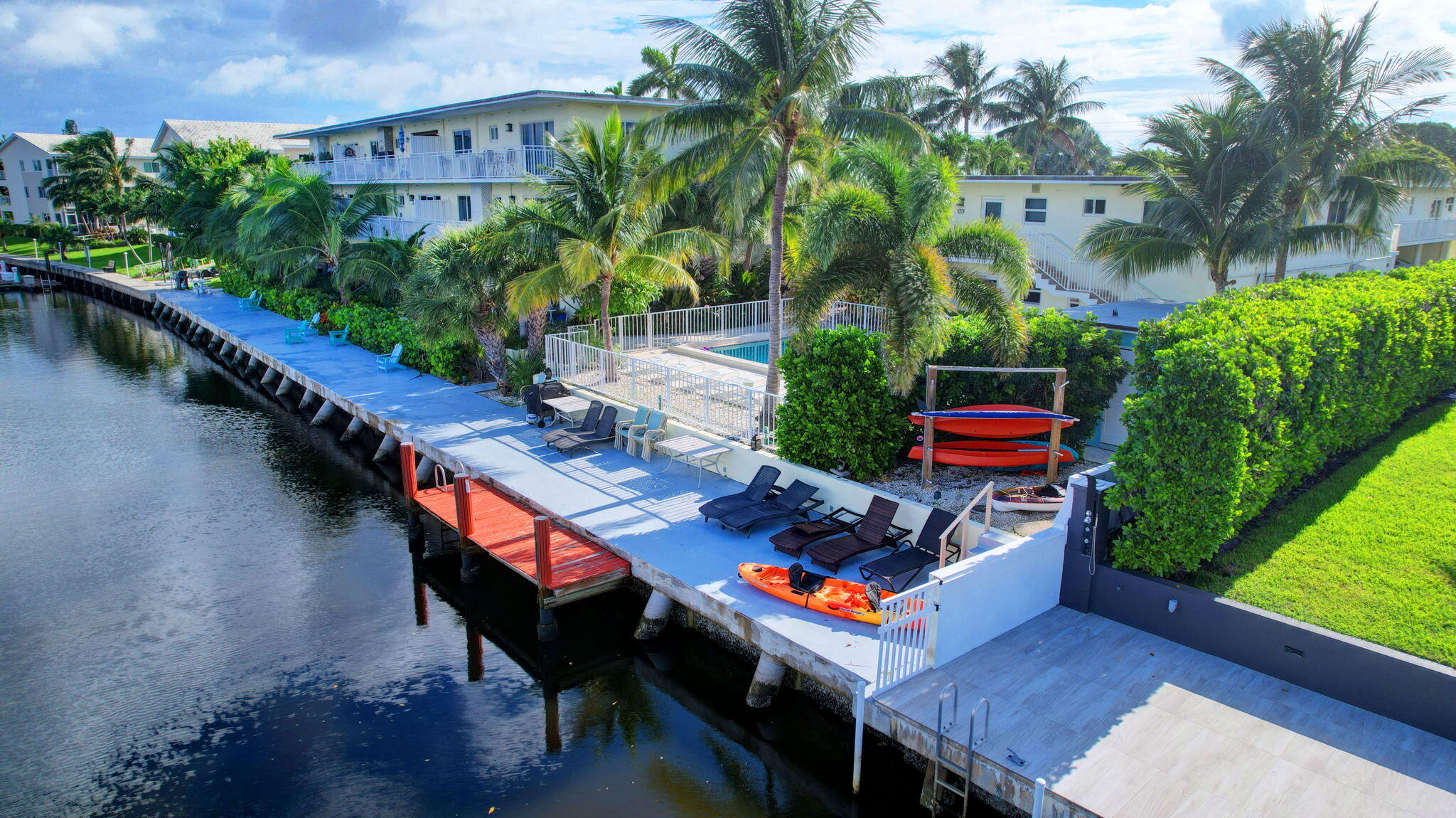 6520 North Ocean Boulevard, Unit 30 Ocean Ridge, FL 33435 - Photo 21 of 29 an outdoor sitting area with chairs