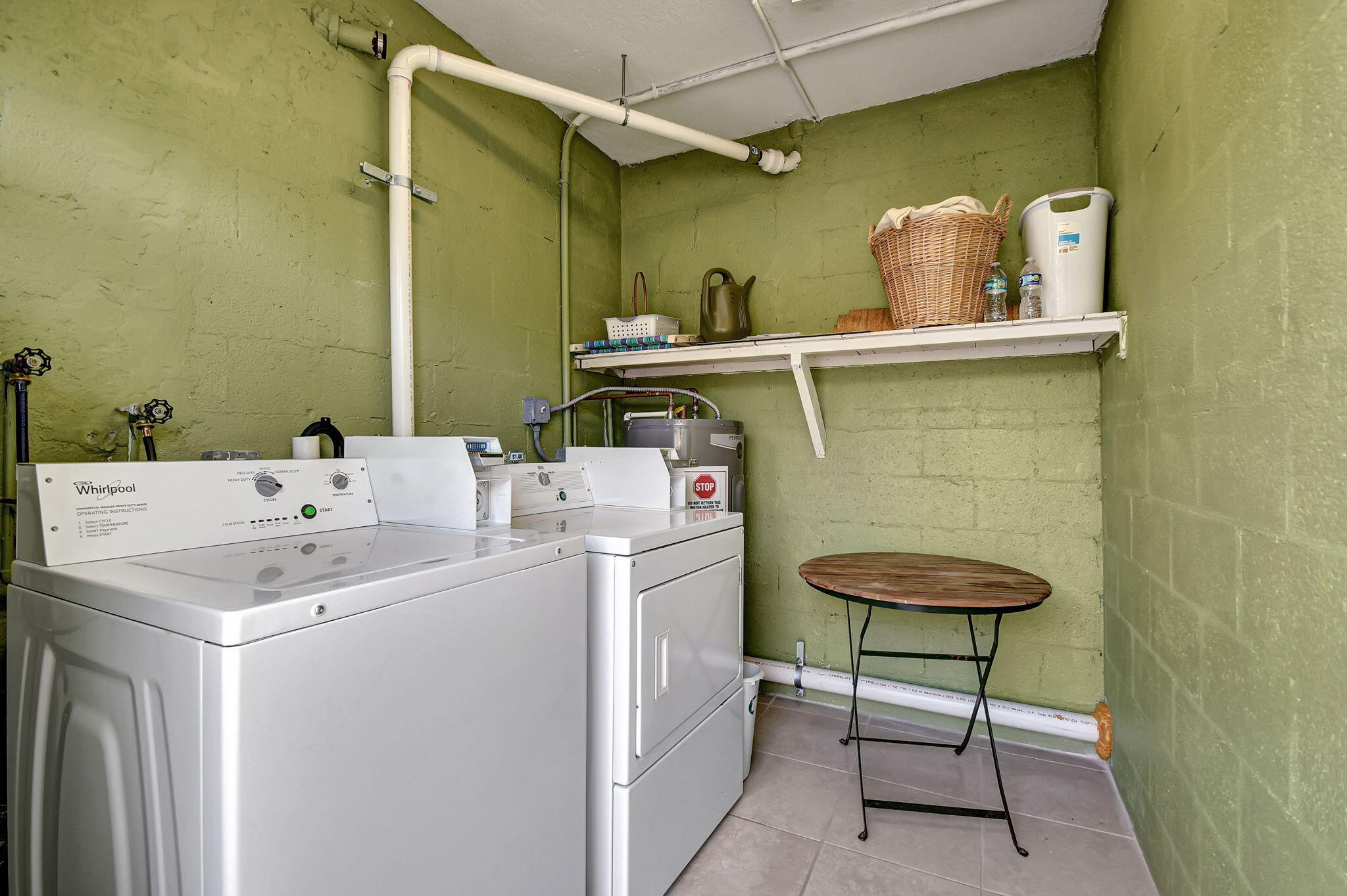 6520 North Ocean Boulevard, Unit 30 Ocean Ridge, FL 33435 - Photo 29 of 29 a utility room with dryer and washer