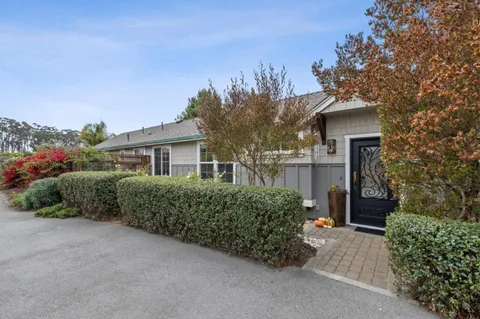 front view of a house with a street