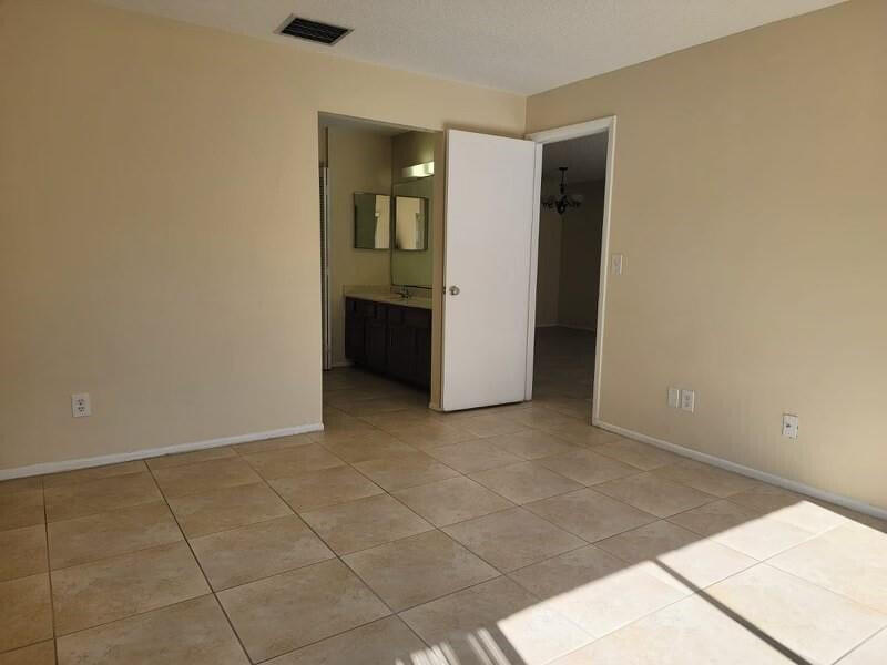 2516 South 19th Street, Unit 208 Fort Pierce, FL 34982 - Photo 14 of 16 a view of an empty room