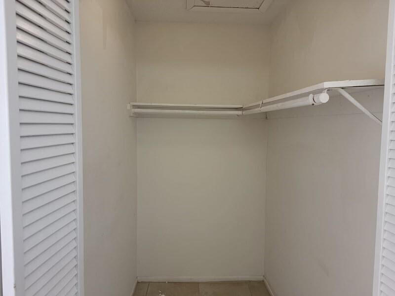 2516 South 19th Street, Unit 208 Fort Pierce, FL 34982 - Photo 4 of 16 a view of an empty walk in closet