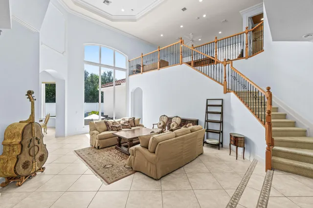 a living room with furniture and white walls