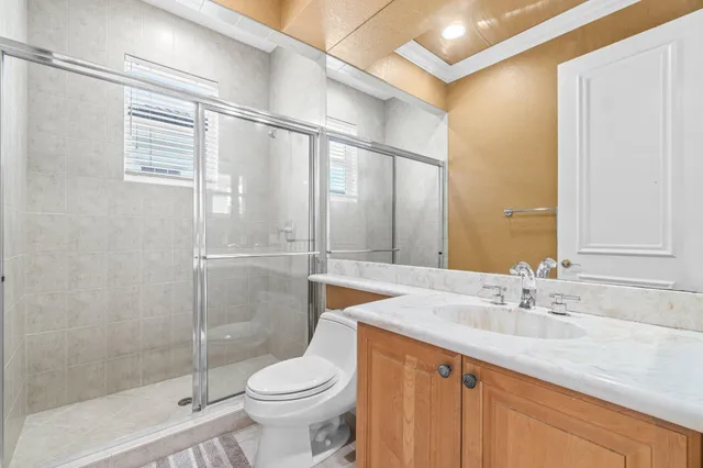 a living room with furniture a rug and a window