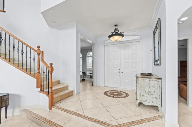 a living room with furniture and white walls