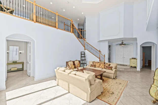 a kitchen with a table chairs stove and cabinets