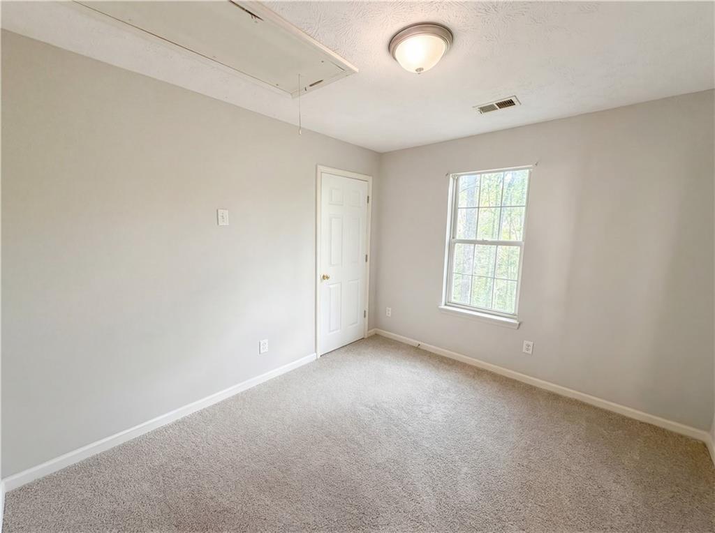 403 Clearstream Lane Austell, GA 30168 - Photo 15 of 25 an empty room with windows