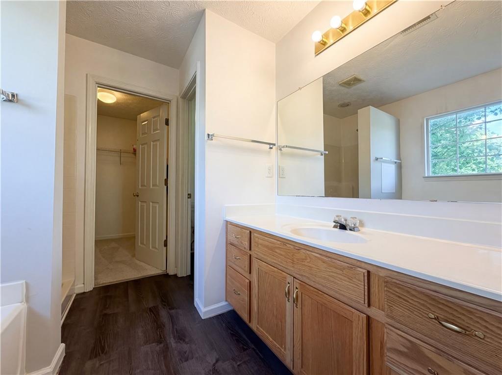 403 Clearstream Lane Austell, GA 30168 - Photo 18 of 25 a bathroom with a sink and a mirror