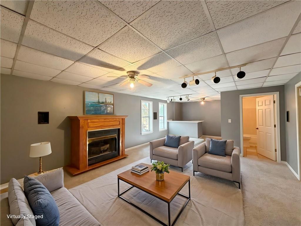 403 Clearstream Lane Austell, GA 30168 - Photo 2 of 25 a living room with furniture and a fireplace