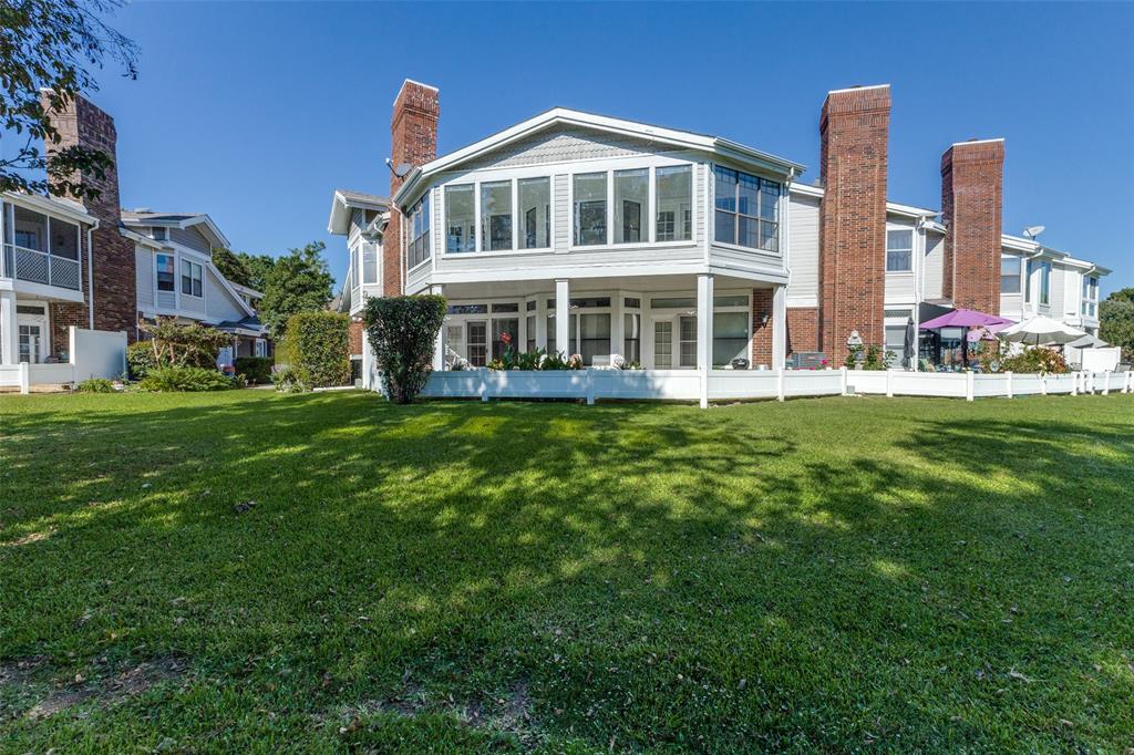 9939 Waterfront Trail Rowlett, TX 75087 - Photo 25 of 25 a front view of a house with a garden and plants