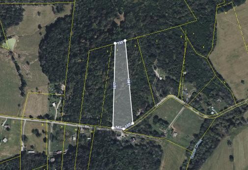 0 Celsor Road Hartsville, TN 37074 - Photo 27 of 27 a house with trees in front of it