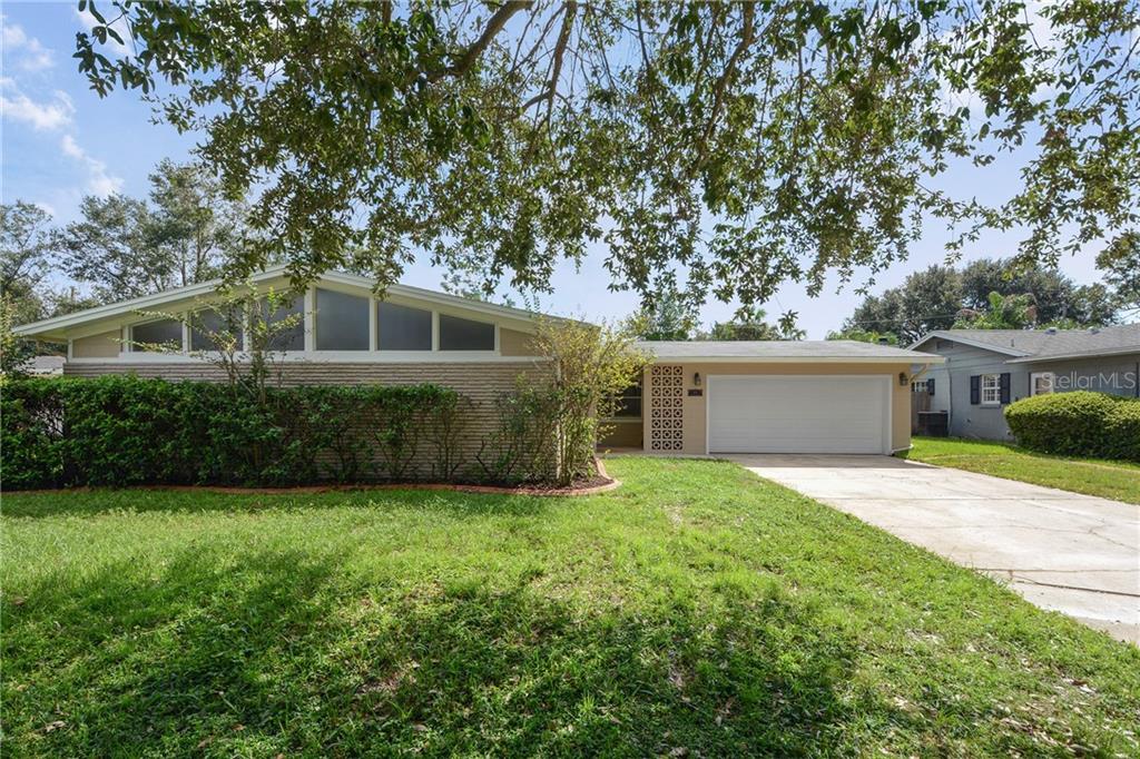 412 Friar Road Winter Park, FL 32792 - Photo 1 of 1 a house that has a tree in front of the house