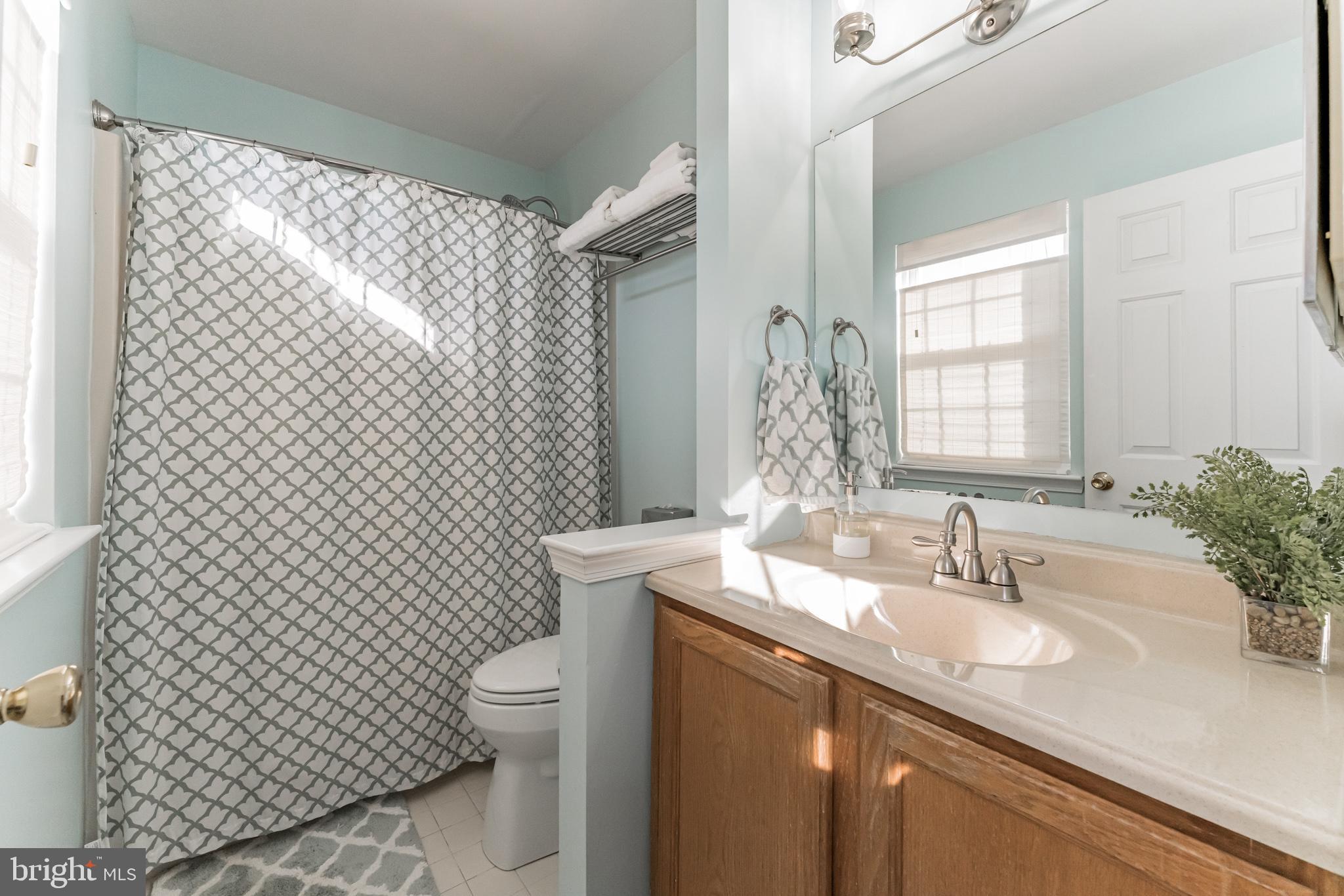 408 Tudor Road Collegeville, PA 19426 - Photo 23 of 30 En Suite has fresh paint and updated lighting