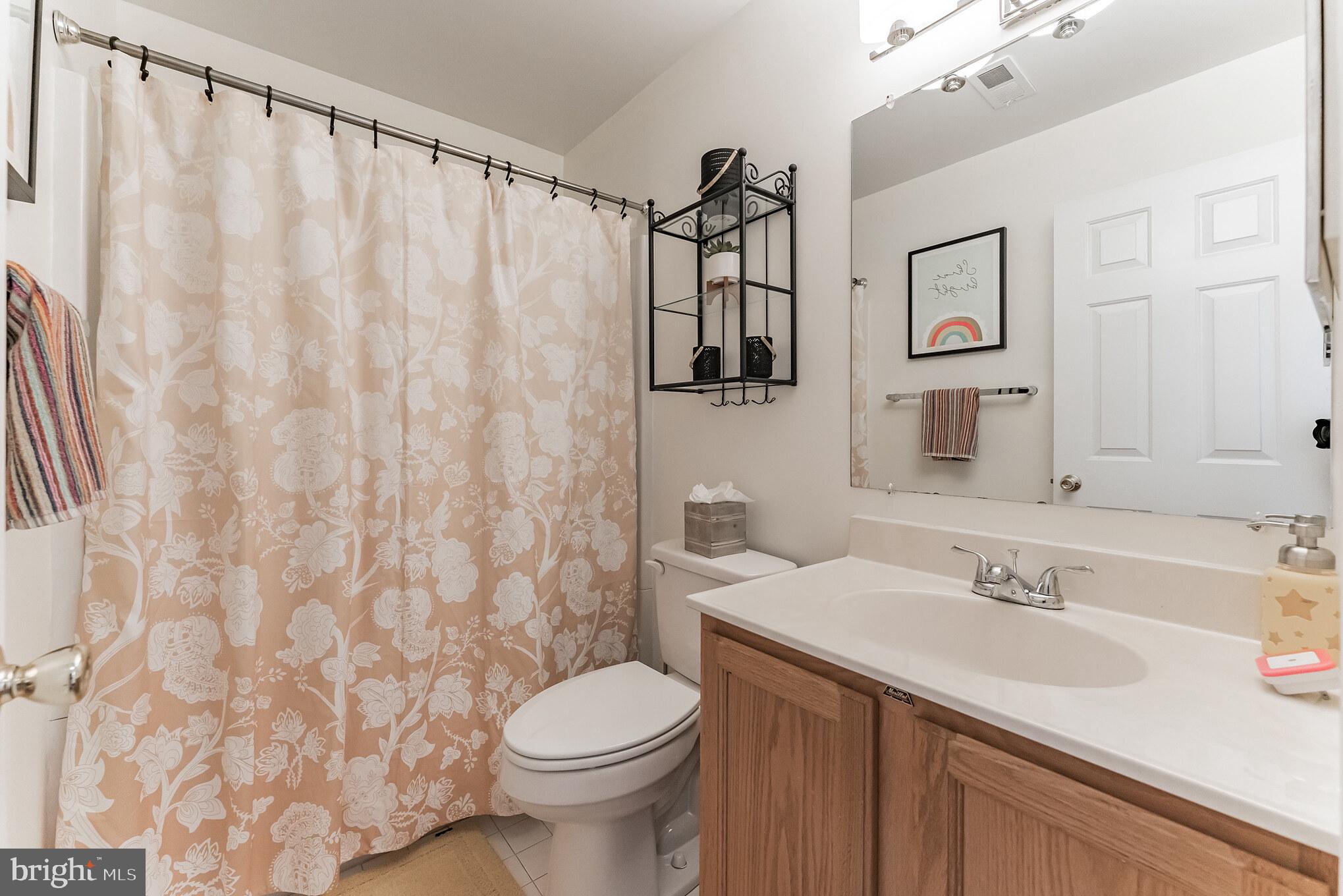 408 Tudor Road Collegeville, PA 19426 - Photo 26 of 30 Hall bath with updated lighting
