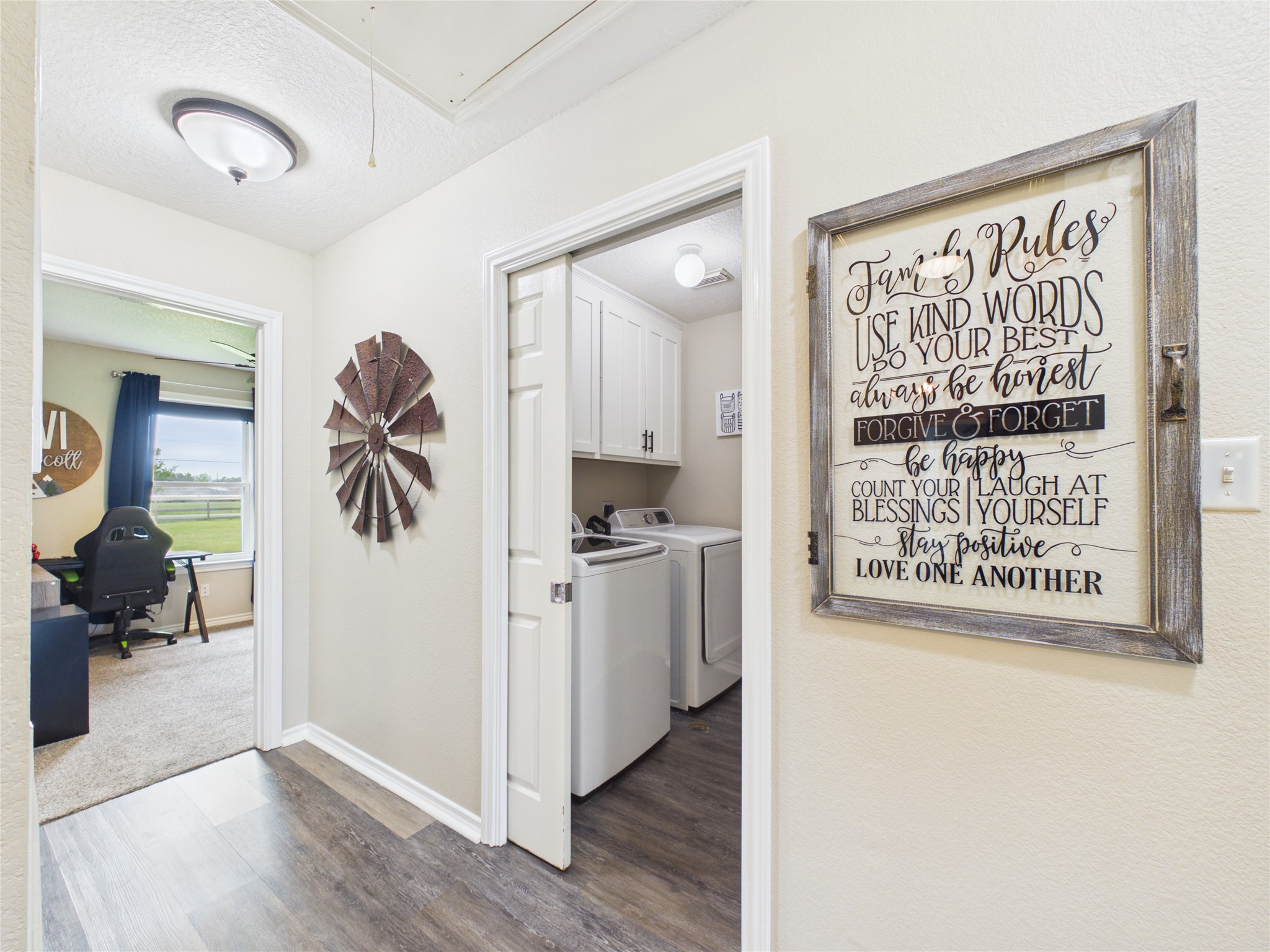 4610 Mustang Road Alvin, TX 77511 - Photo 38 of 50 Pocket door entry to the nice size laundry room that has generous amounts of cabinets/storage!