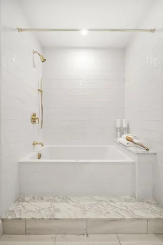 a bathroom with a bathtub