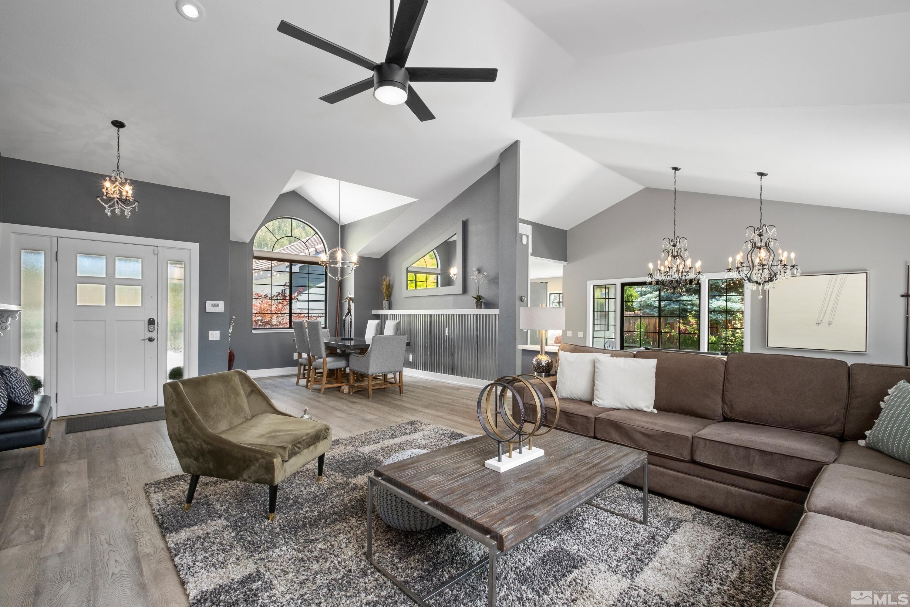 14195 Riata Circle Reno, NV 89521 - Photo 6 of 29 a living room with furniture and a large window