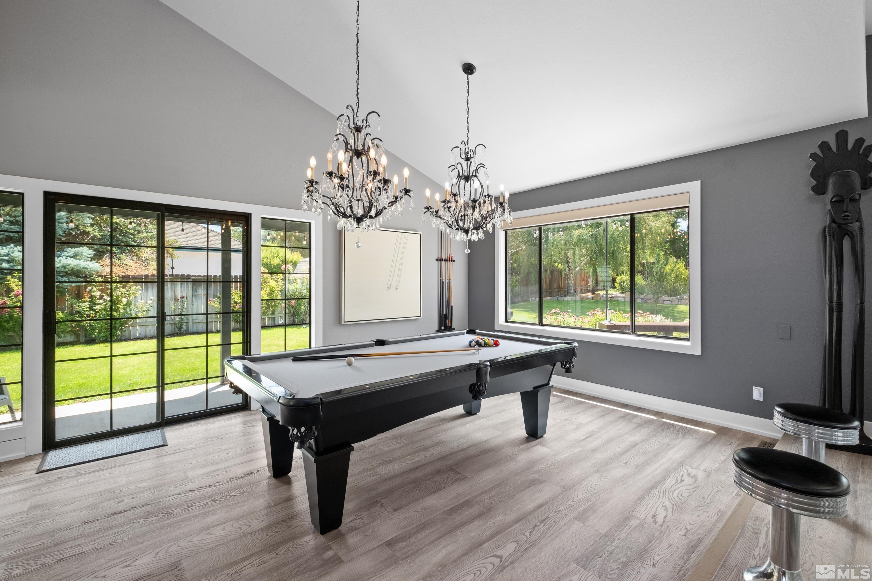 14195 Riata Circle Reno, NV 89521 - Photo 8 of 29 a room with pool table and windows